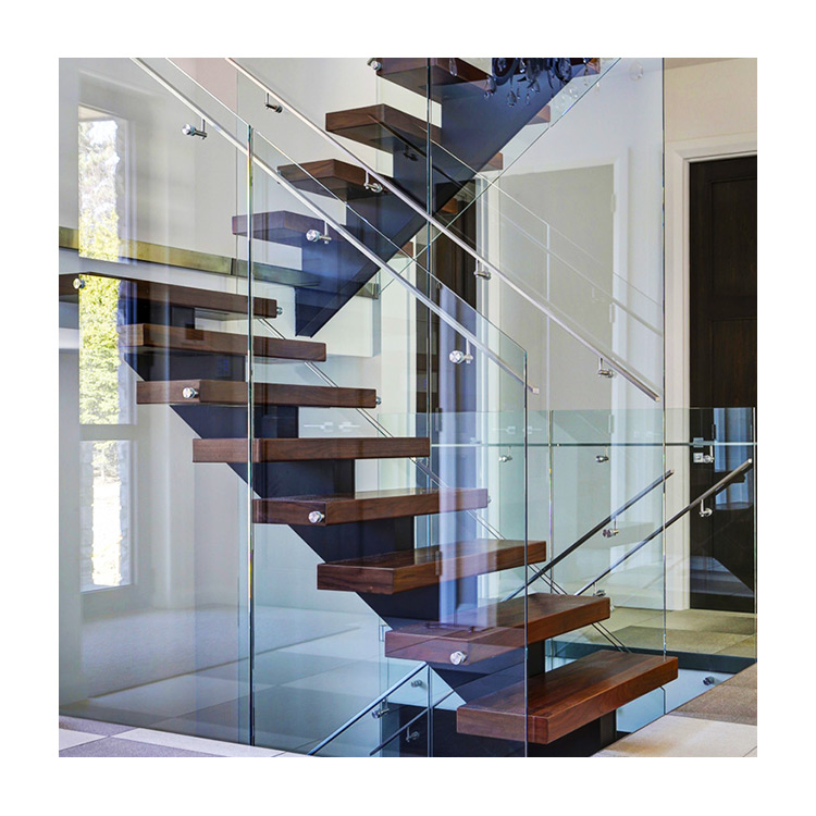 Escalier flottant de balustrade en verre de haricot noir contemporain fait sur commande avec la bande de roulement en bois
