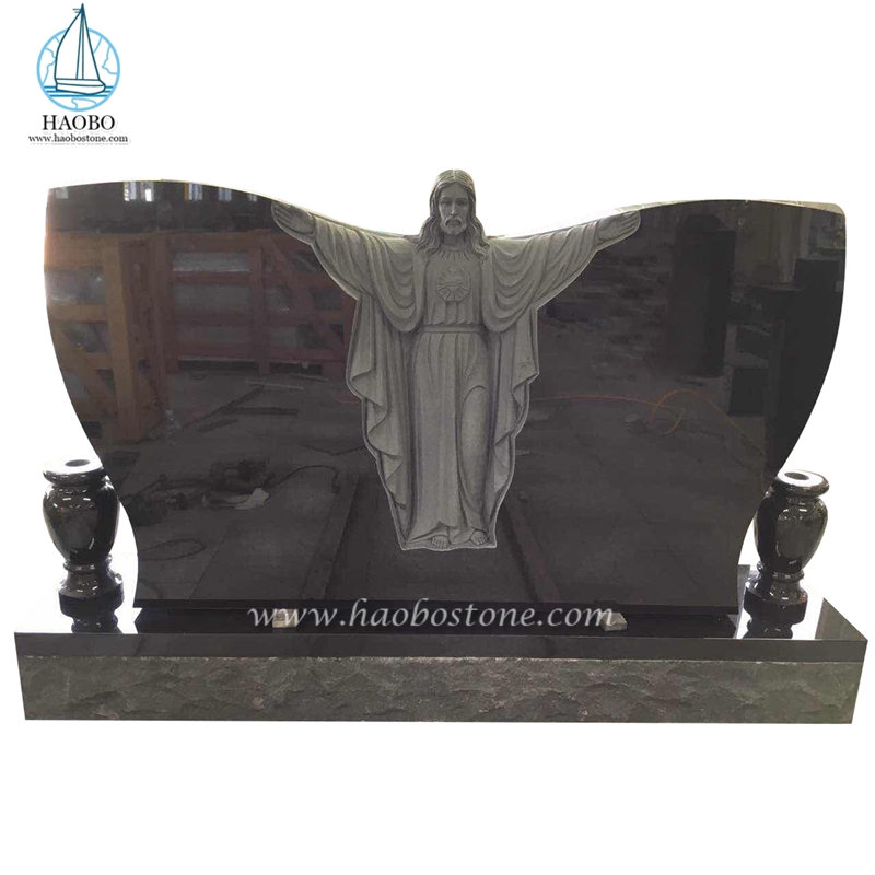 Pierre tombale funéraire sculptée par Jésus en forme de papillon de granit noir
