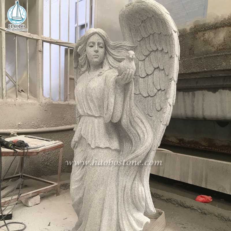 Ange de granit blanc personnalisé tenant une statue de colombe
