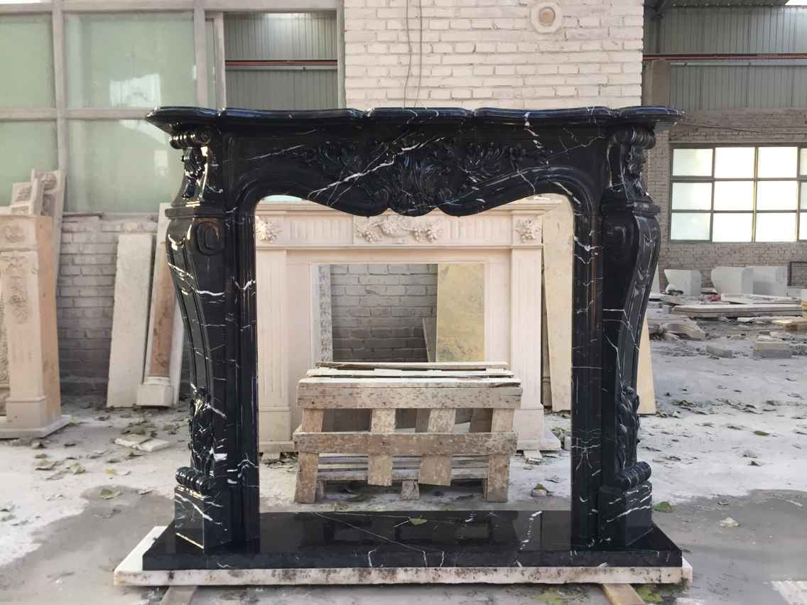 cheminée ancienne en marbre noir
