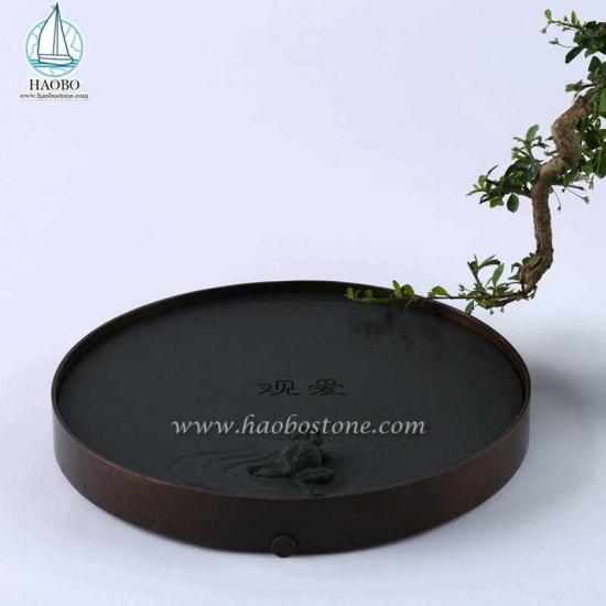 Plateau à thé en pierre sculptée en pierre naturelle de granit noir Chine
