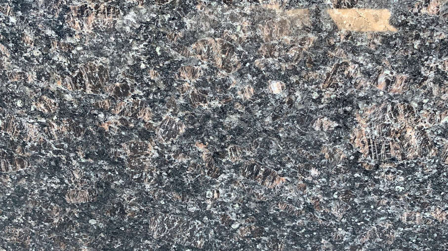 granit foncé brun tan