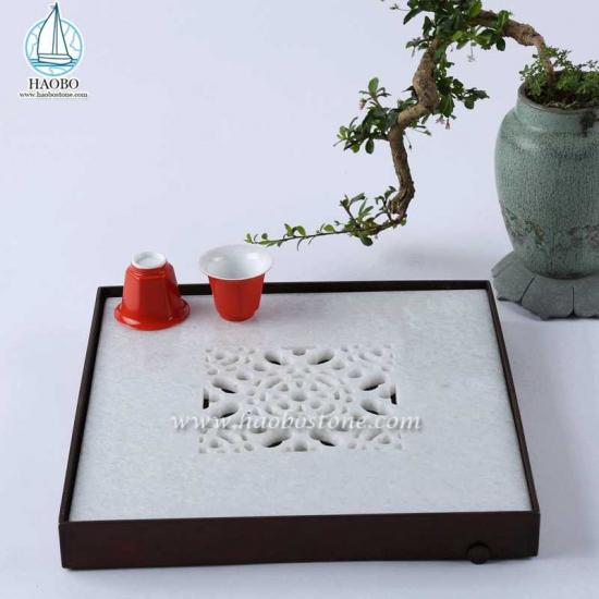 Plateau de thé en pierre carrée de sculpture creuse en marbre blanc de Chine
