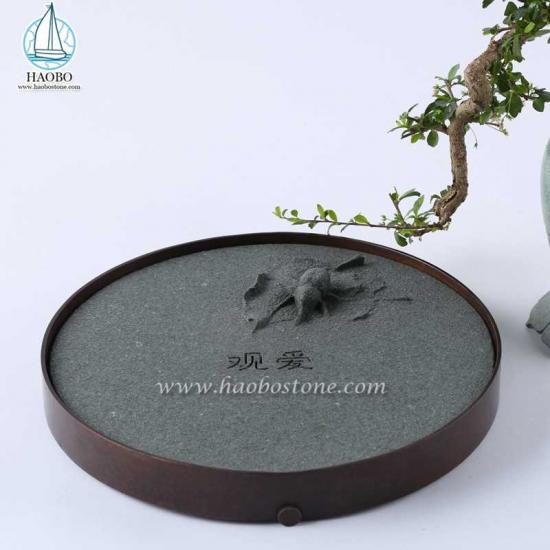 Plateau à thé en pierre sculptée en forme d'insecte en granit gris de Chine
